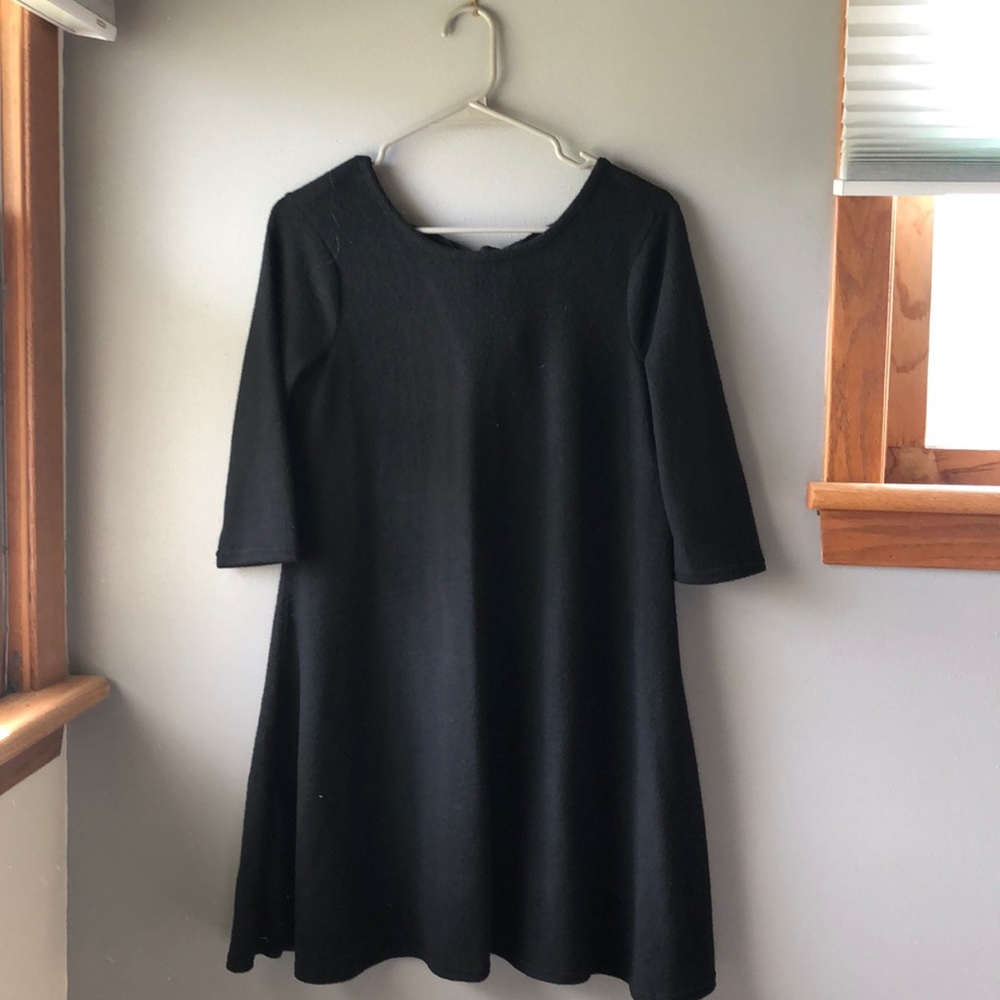 Quarter sleeve dress with open back!